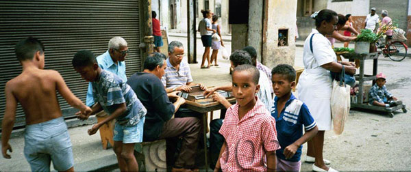 Photograph of Children and chess players in the streetm Havana Cuba 1997