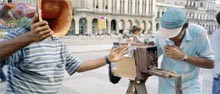 photograph of photographer  on street in Havana Cuba