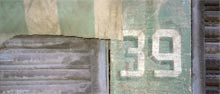 photograph of abstract forms and number on wall in Mexico City